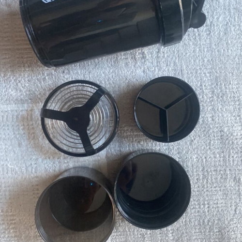 Black Protein Shaker Bottle new with storage compartment