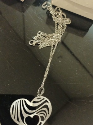 Silver heart pendant necklace