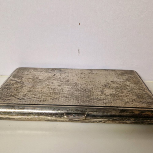 Cigarette case used, silver with slight wear