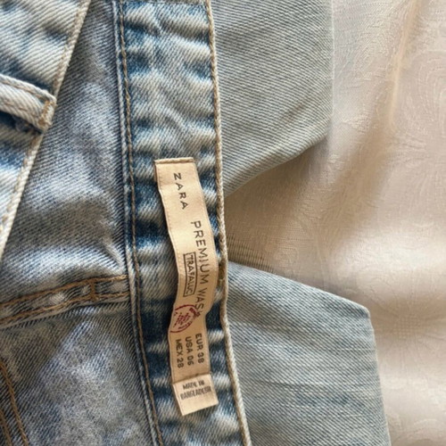 Zara Jean light color with knee rips, like new