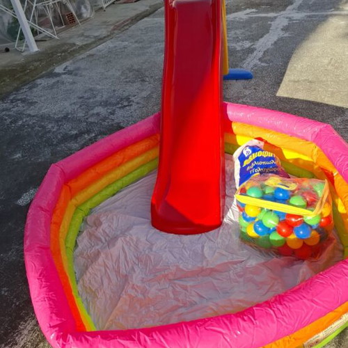 Children's slide with inflatable pool and 100 colorful balls, new