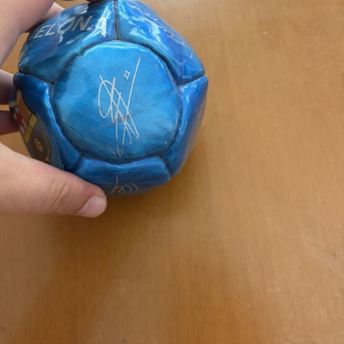 Decorative Barcelona ball with Messi, Xavi, Iniesta signatures