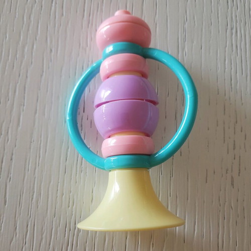 Baby toys ball and horn like new in pastel colors
