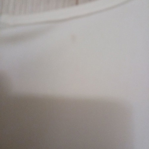 H&M white dress used, size 42 with small yellow mark