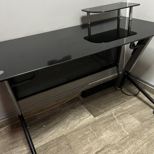 Glass desk used with metal frame, modern design