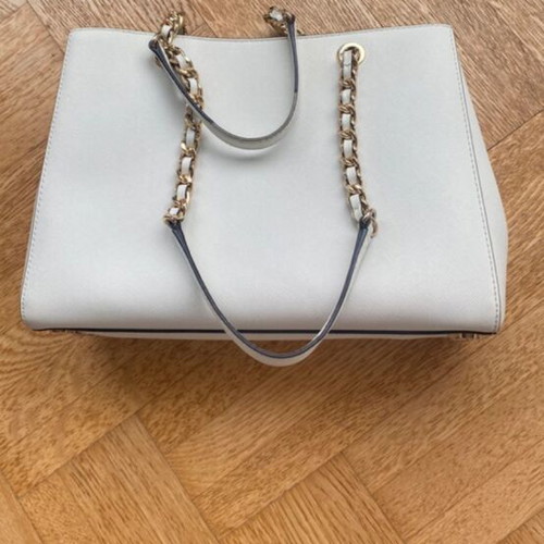 Michael Kors white tote bag with floral and dragonfly details