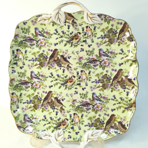 Porcelain serving platter decorated with birds and flowers like new