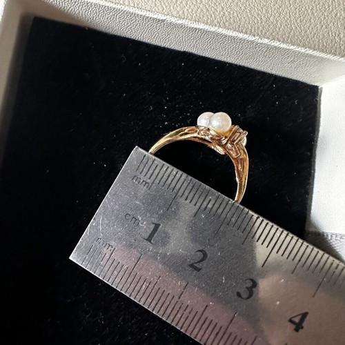 Vintage gold rings set used with pearls and green stone