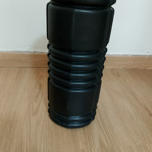 Foam roller like new with textured surface for massage and muscle recovery