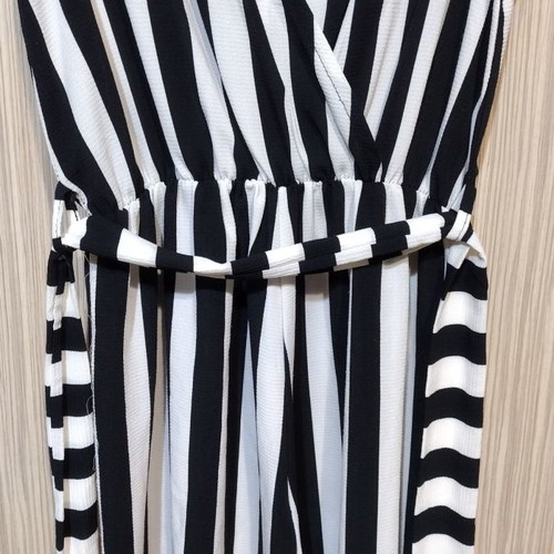 Striped polyester one-piece used, medium size with waist tie