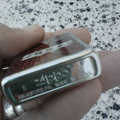 Zippo 2011 lighter with embossed design