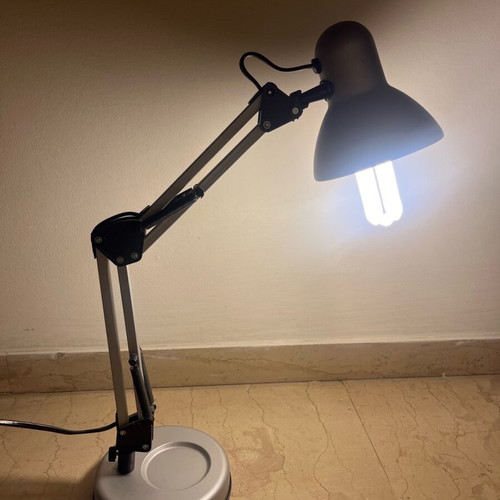 Adjustable desk lamp used