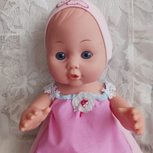 Baby Suzi doll like new with handmade clothes