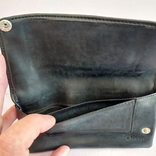 Black leather tobacco pouch used with paper holder