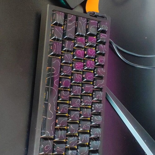 ASUS ROG Strix G531GT gaming laptop with headphones and keyboard