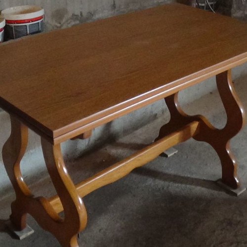 Wooden dining table used with extension