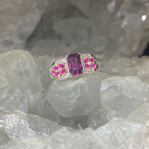 Silver ring with natural rhodolite garnet and moissanite