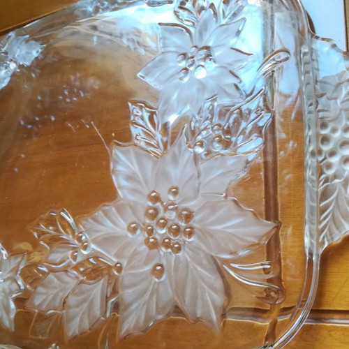 Serving tray used with embossed glass designs