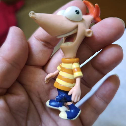 Disney Phineas figure used with paint damage