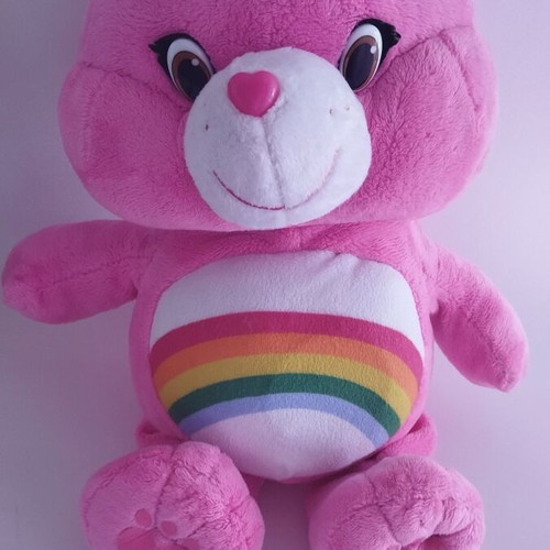 Care Bear Love Bear used, talks and laughs