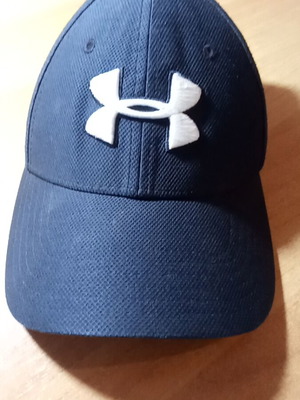 Under Armour cap unisex, like new, black leather, sizes S and M