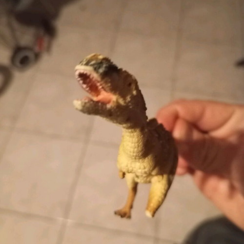 Dinosaur plastic toy like new, miniature