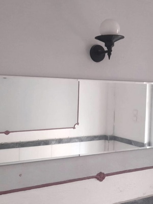 Vintage horizontal wall mirror used with beveled edge