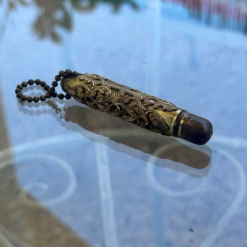 Vintage decorative pen with metal case and red stone used