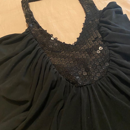 Black top blouse size S with sequins and gathers like new