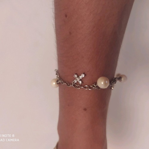Bracelet with hanging crosses and pearls like new