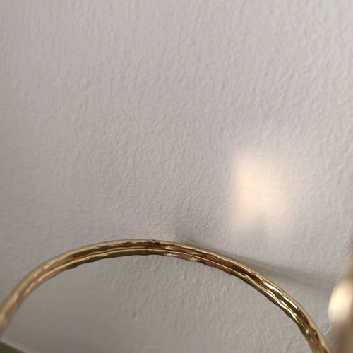 Cuff bracelet used with 2 gold-tone hearts