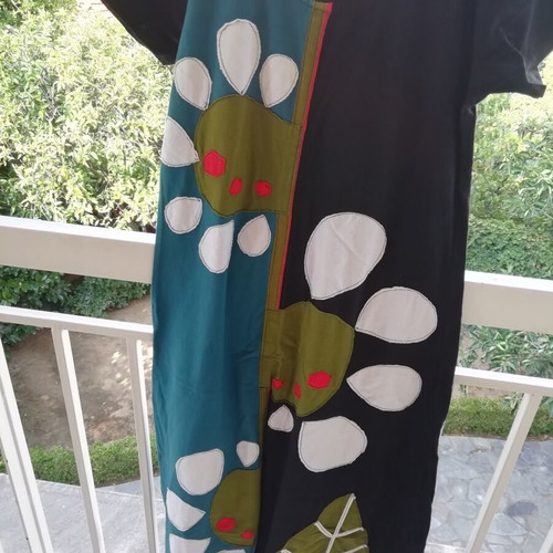 Platinum dress with appliqué designs like new, colorful