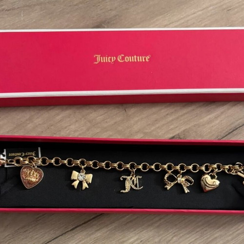 Juicy Couture bracelet with charms, like new, gold tone