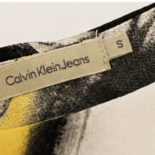 Calvin Klein midi dress like new with black, white and yellow print, size S