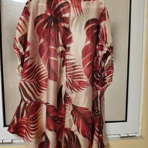 Urban women's semi-transparent blouse with tropical print, like new, one size