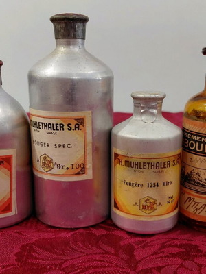 Vintage sealed perfume essence bottles from the 1960s