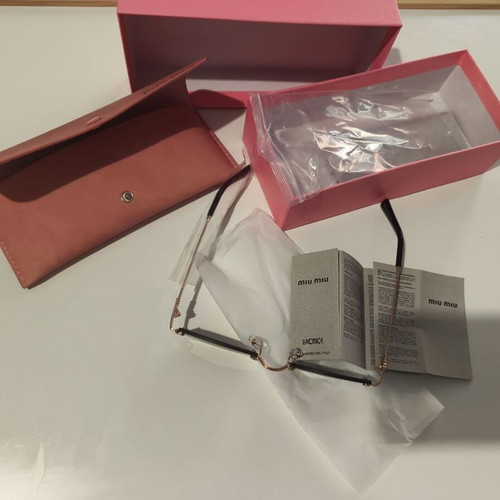 Miu Miu sunglasses women like new, black and gold