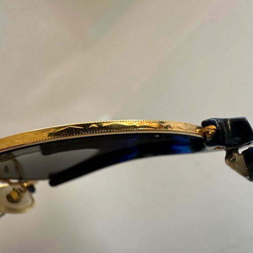 Vintage Kurzenberger sunglasses with blue marbled frame and golden details