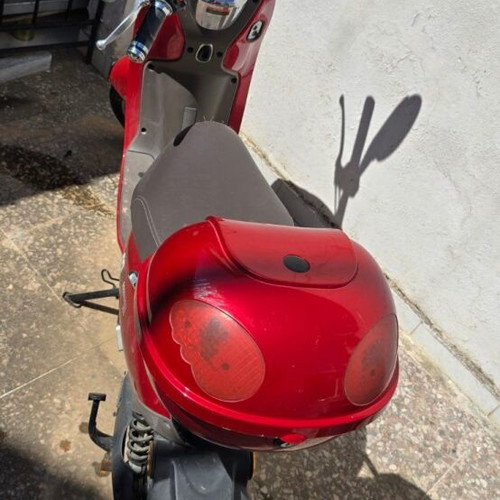 Red electric scooter for repair or spare parts