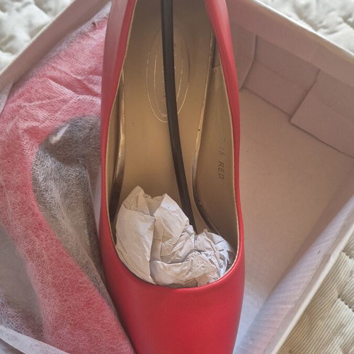 Red high heel pumps