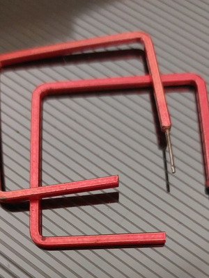 Square earrings used, missing fasteners