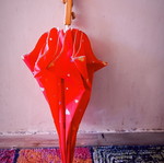 Children's umbrella red with patterns used