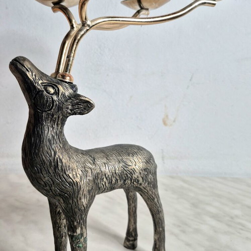 Vintage metal deer-shaped candle holder used