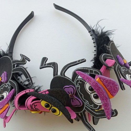 Children's Halloween headband used with spiders and feathers