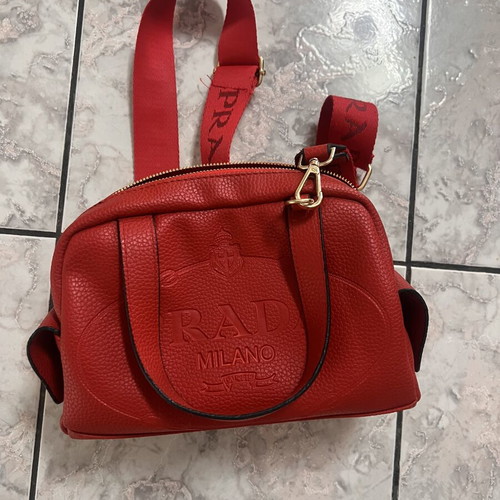 Shoulder bag new, red, with dust bag