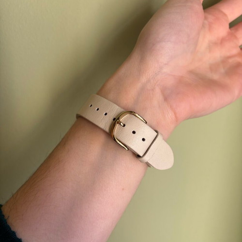 Tommy Hilfiger women's watch like new with gold case and beige leather strap