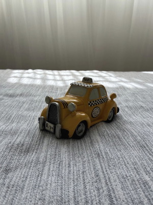 Taxi piggy bank, porcelain