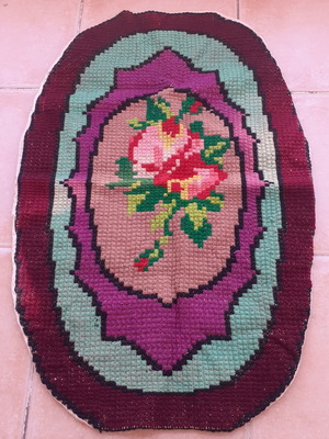 Handmade oval embroidered rug like new