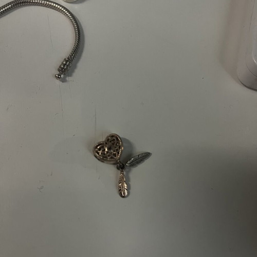 Pandora bracelet 17cm like new with charm, clasp repair needed