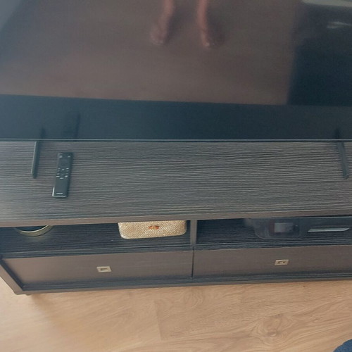 TV stand like new with two drawers and two shelves, wheels